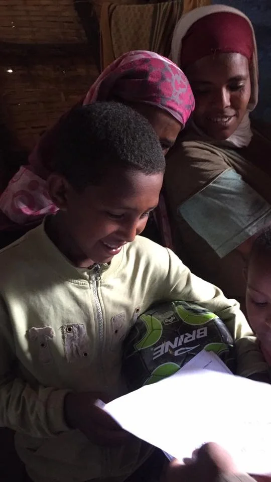 Delivering letters and packages to sponsor kids and families